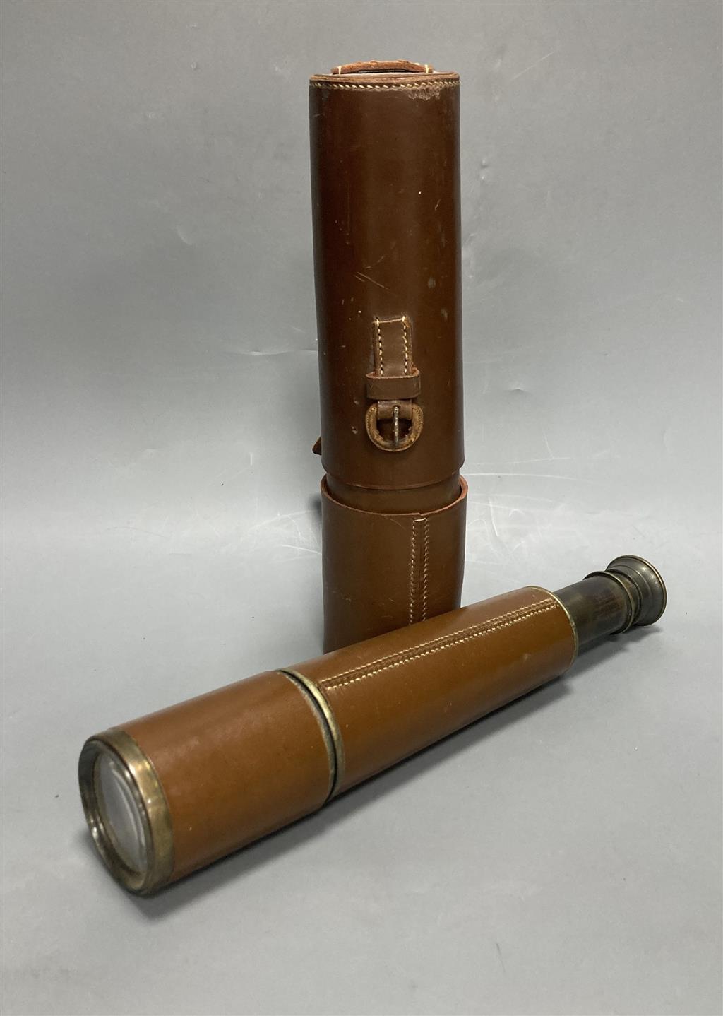 A Broadhurst & Clarkson brass three drawer telescope